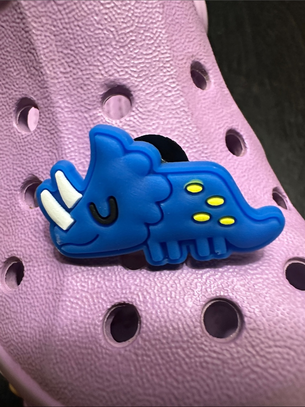 Jibbitz Blue Triceratops Shoe Charm with Yellow Spots